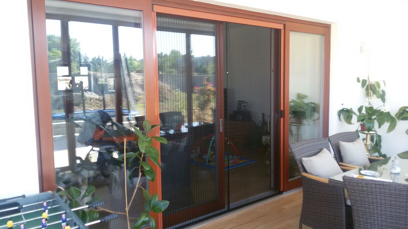 Elegantní a funkční řešení sítě do francouzského okna - posuvná síť